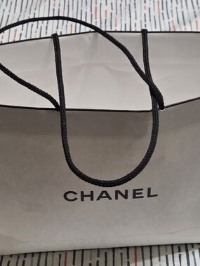 CHANEL Paper Shopping Bag in White with Black Handles